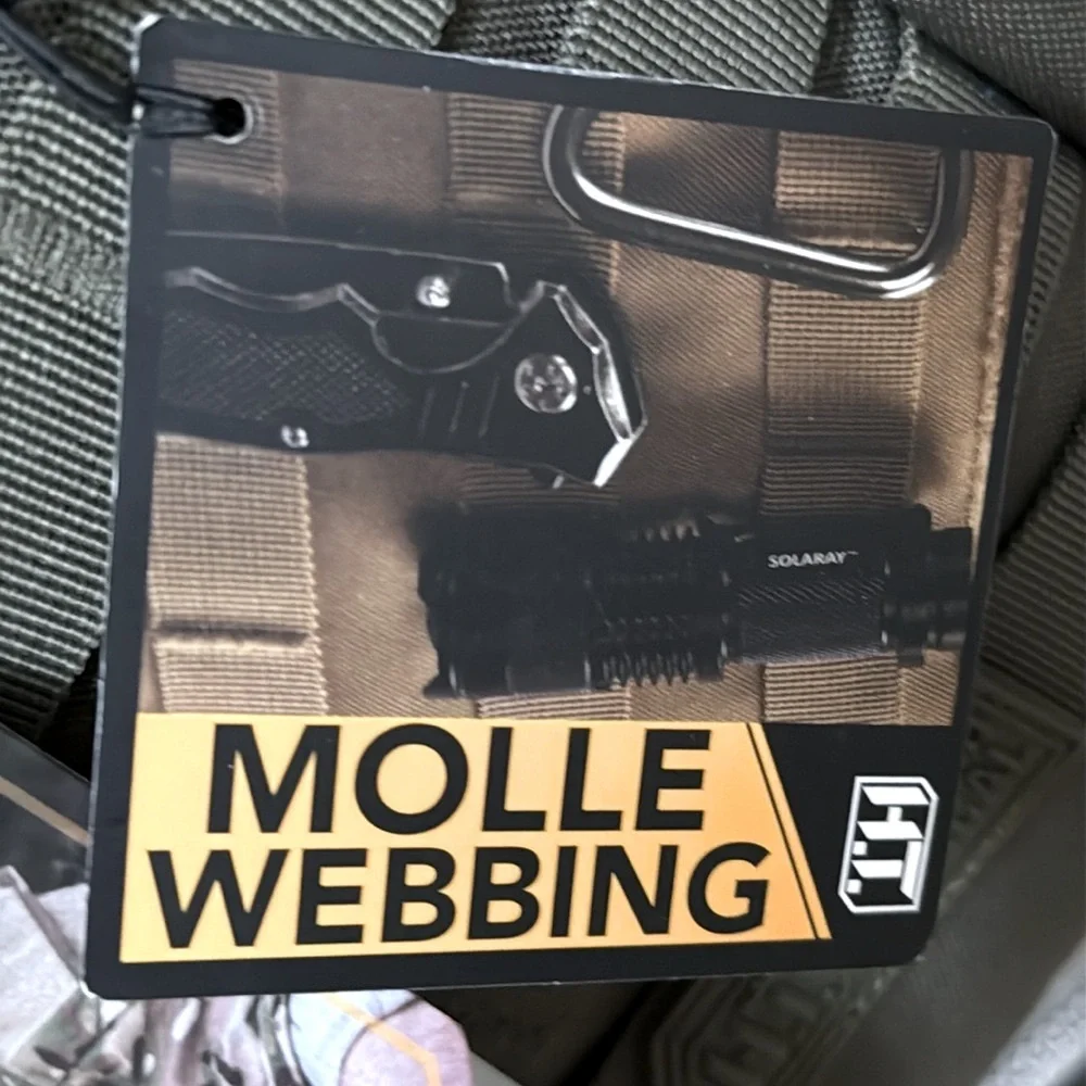 Tactical Sling Bag - Olive Green. Multiple pockets. Spacious compartments.